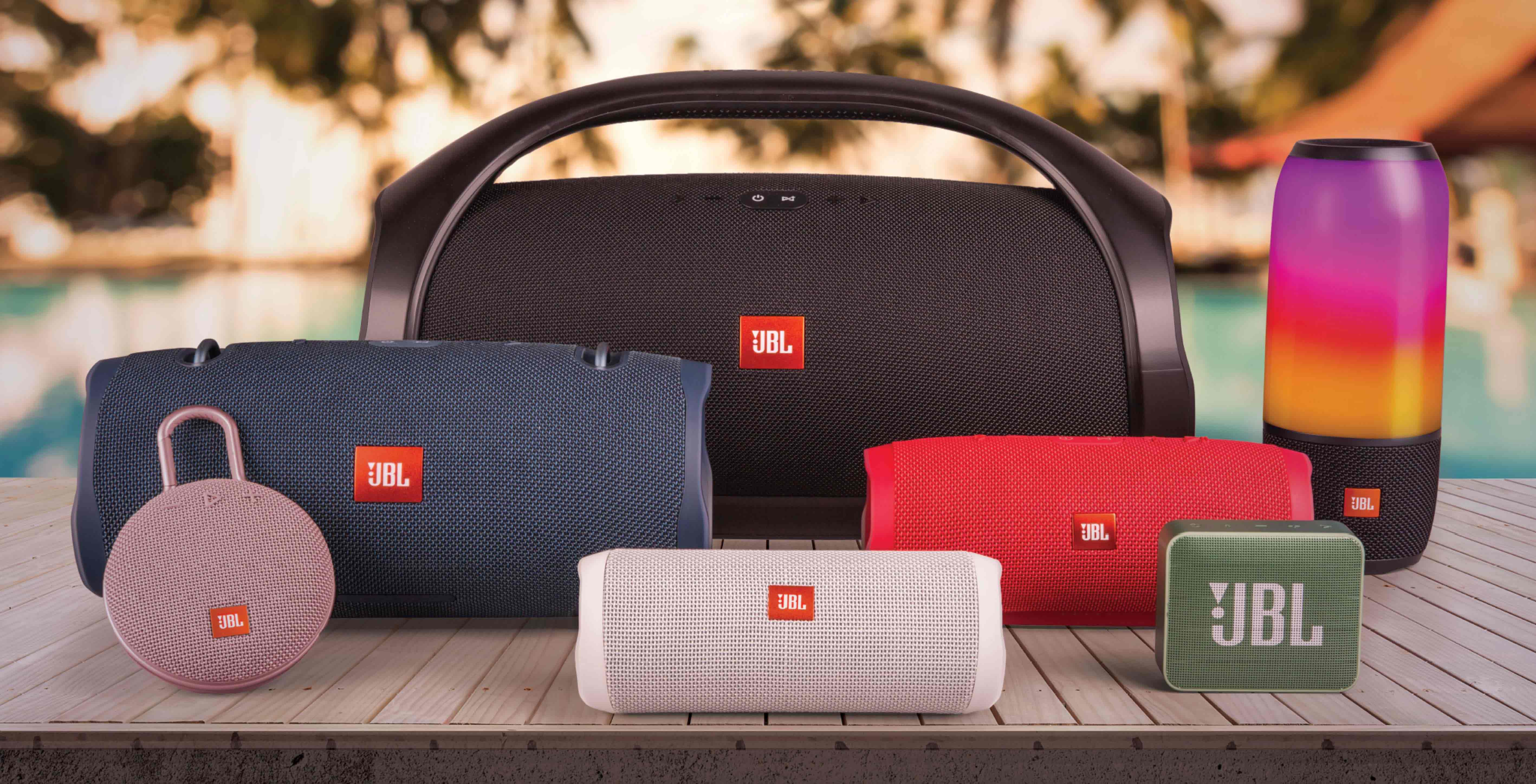 Two stylish speakers on a shelf, designed for optimal sound quality, blending seamlessly with contemporary decor.